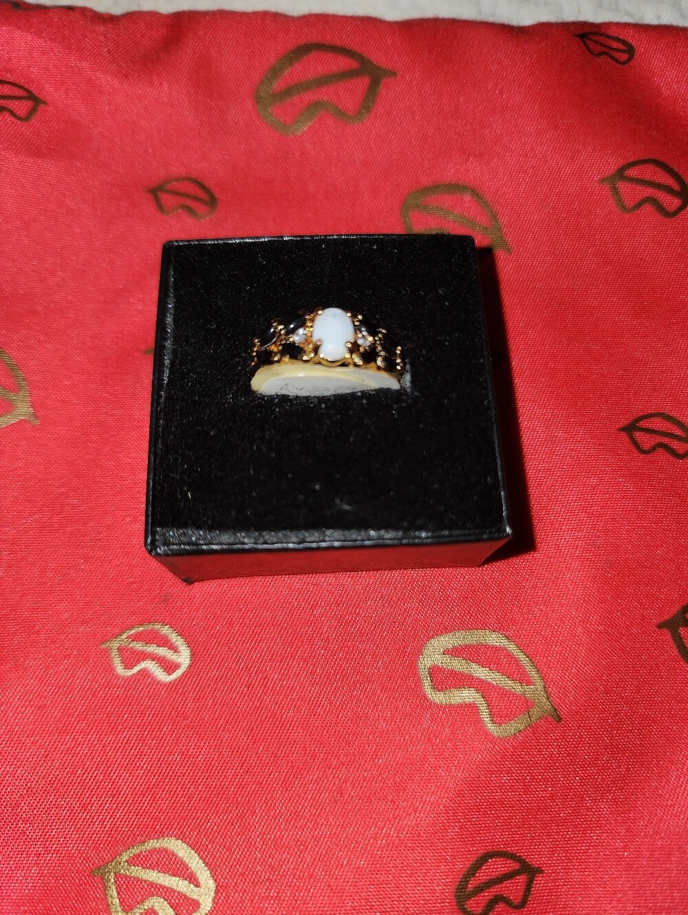 Gold-Tone ElectroplatedCrown Ring with White Opalescent Stone
